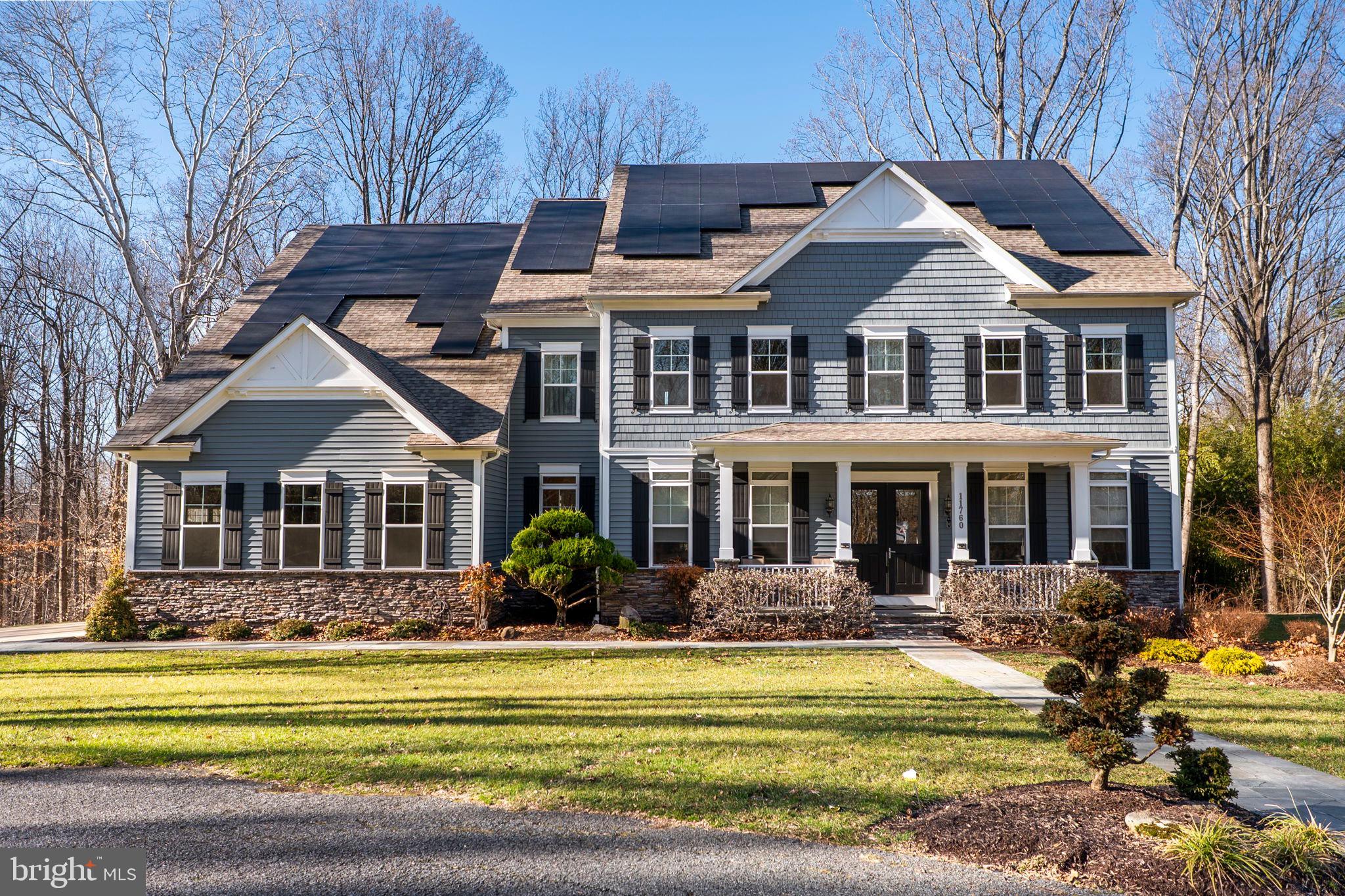 a front view of a house with swimming pool