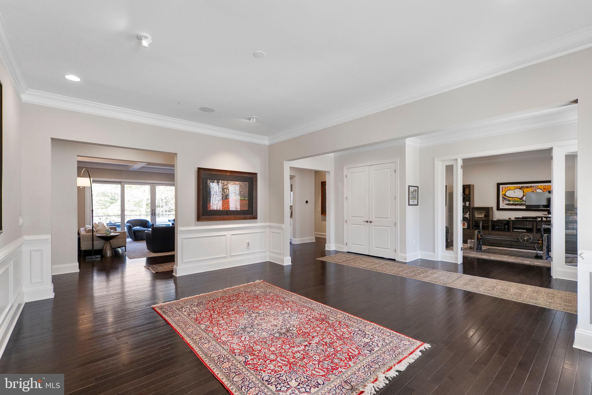 11760 Glen Mill Road Potomac, MD 20854 - Photo 11 of 64 a living room with furniture and a wooden floor