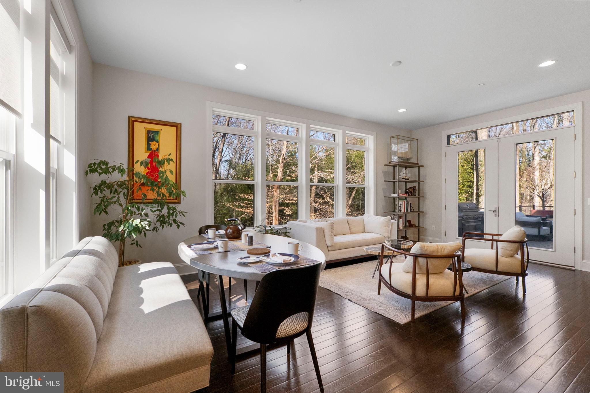 11760 Glen Mill Road Potomac, MD 20854 - Photo 21 of 64 a living room with furniture and a large window