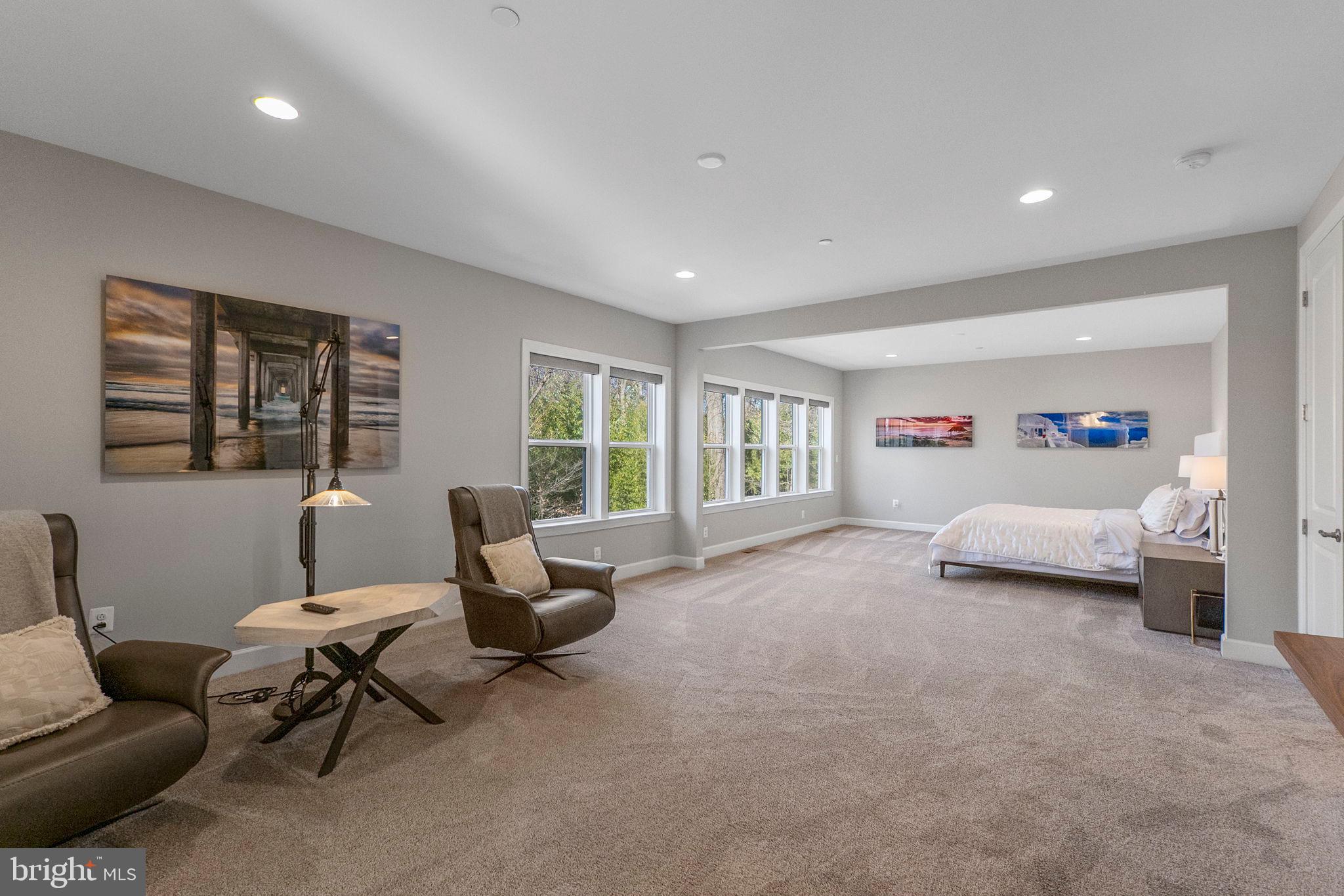 11760 Glen Mill Road Potomac, MD 20854 - Photo 26 of 64 a living room with furniture and a large window