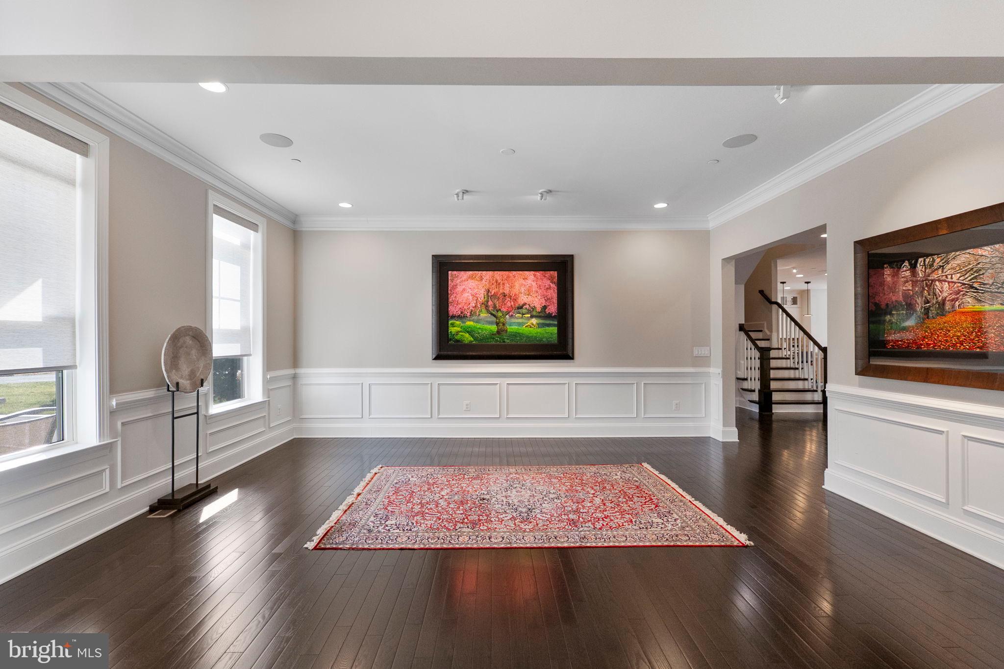 11760 Glen Mill Road Potomac, MD 20854 - Photo 3 of 64 a living room with furniture and a flat screen tv