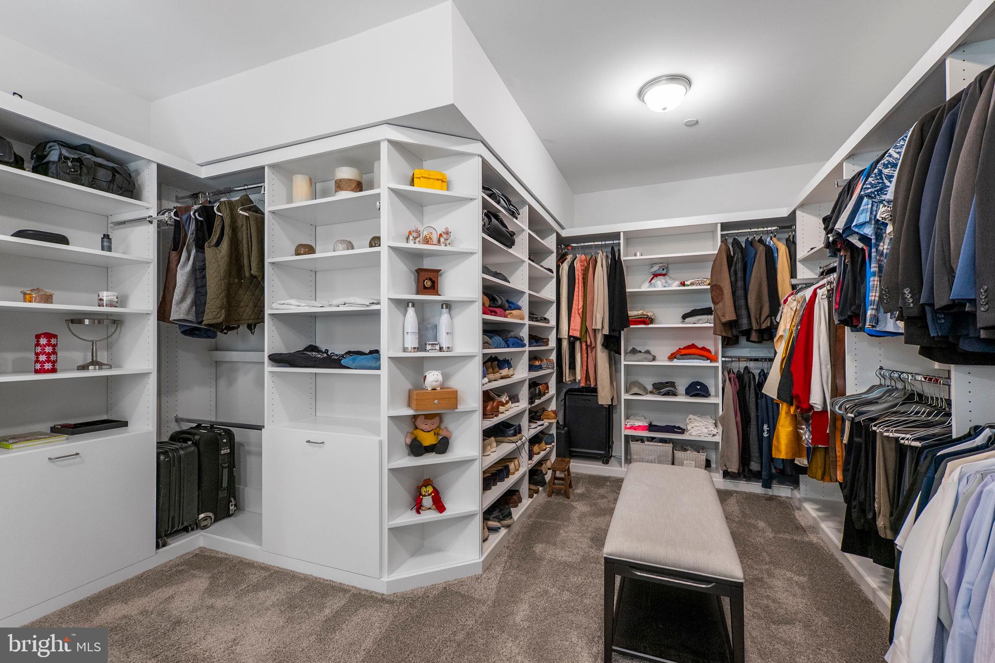 11760 Glen Mill Road Potomac, MD 20854 - Photo 32 of 64 a view of walk in closet with clothes and shoes