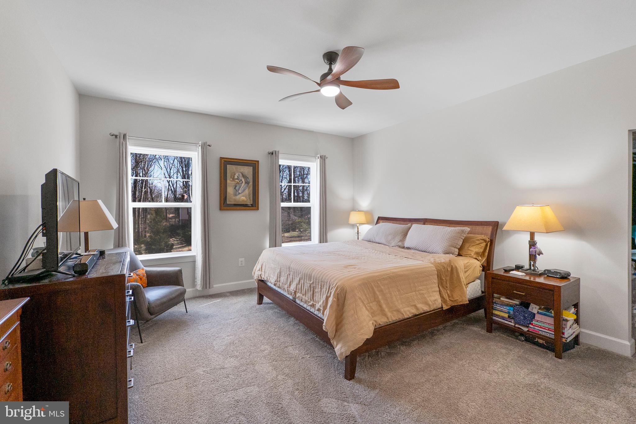 11760 Glen Mill Road Potomac, MD 20854 - Photo 38 of 64 a bedroom with a bed and a window