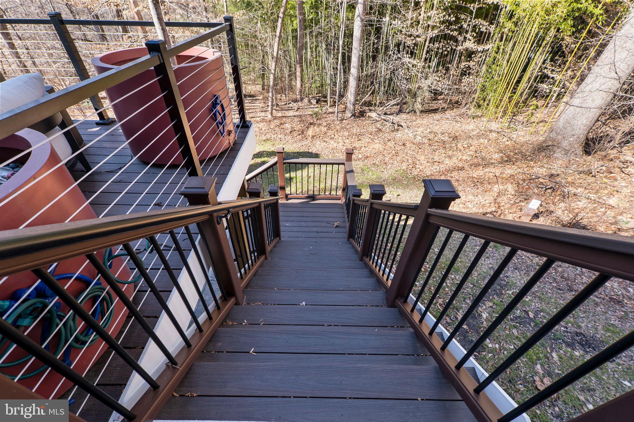 11760 Glen Mill Road Potomac, MD 20854 - Photo 52 of 64 a view of balcony with wooden floor and fence