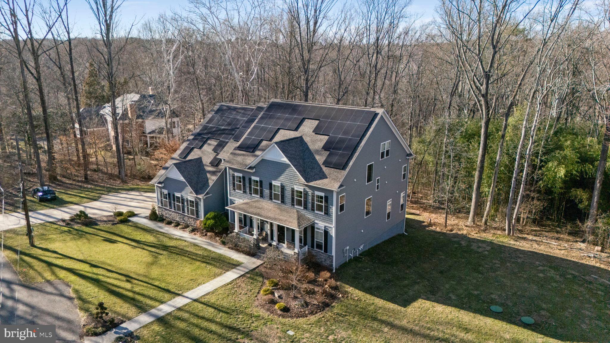 11760 Glen Mill Road Potomac, MD 20854 - Photo 60 of 64 a view of a house with a yard from a balcony