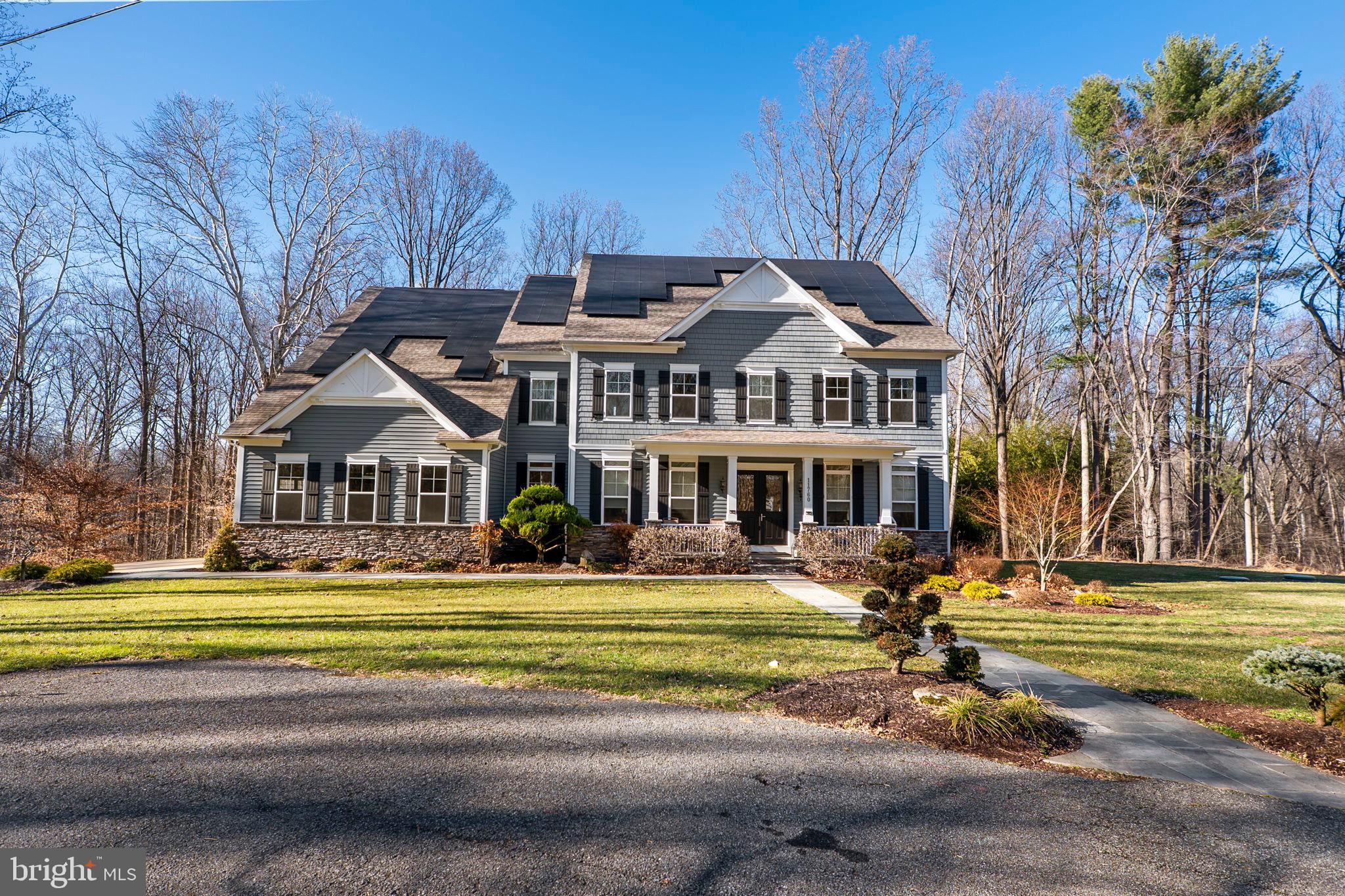 11760 Glen Mill Road Potomac, MD 20854 - Photo 64 of 64 a front view of a house with a yard