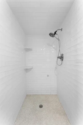 a bathroom with a bath tub