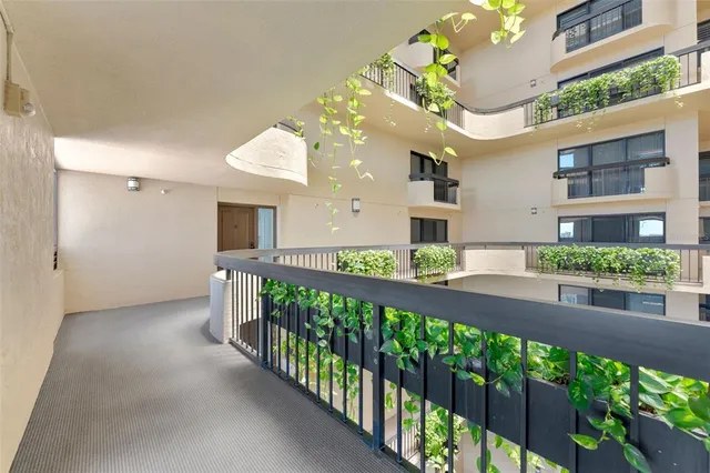 an aerial view of residential house with outdoor space and parking