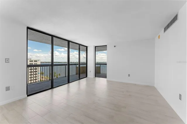 wooden floor in an empty room with a sliding door