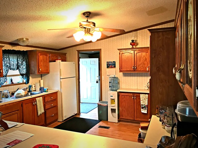 3557 East 1925th Road Ottawa, IL 61350 - Photo 8 of 20 a view of a kitchen with appliances and cabinets