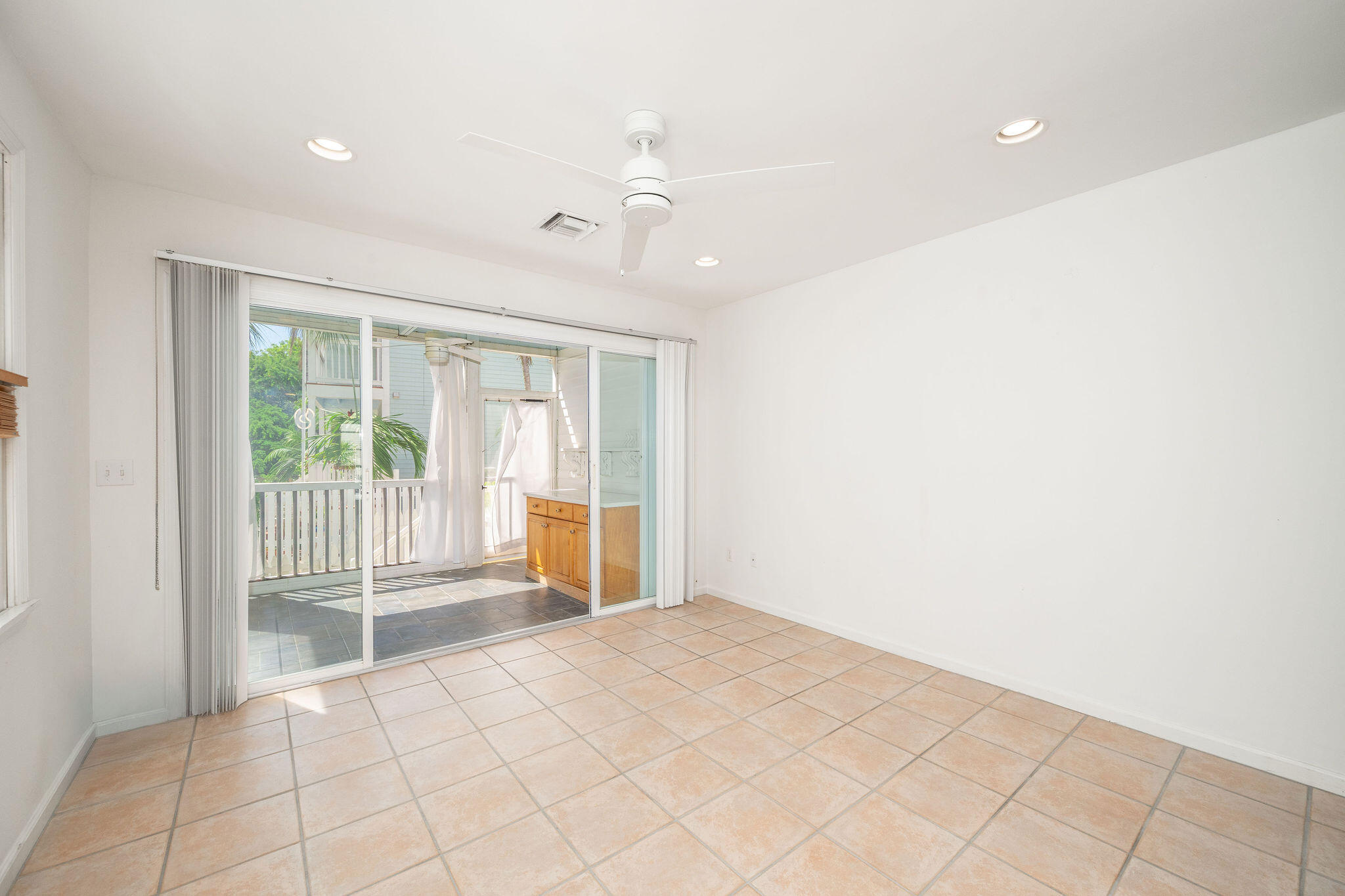 1 Spoonbill Way Key West, FL 33040 - Photo 15 of 38 a view of an empty room with a window