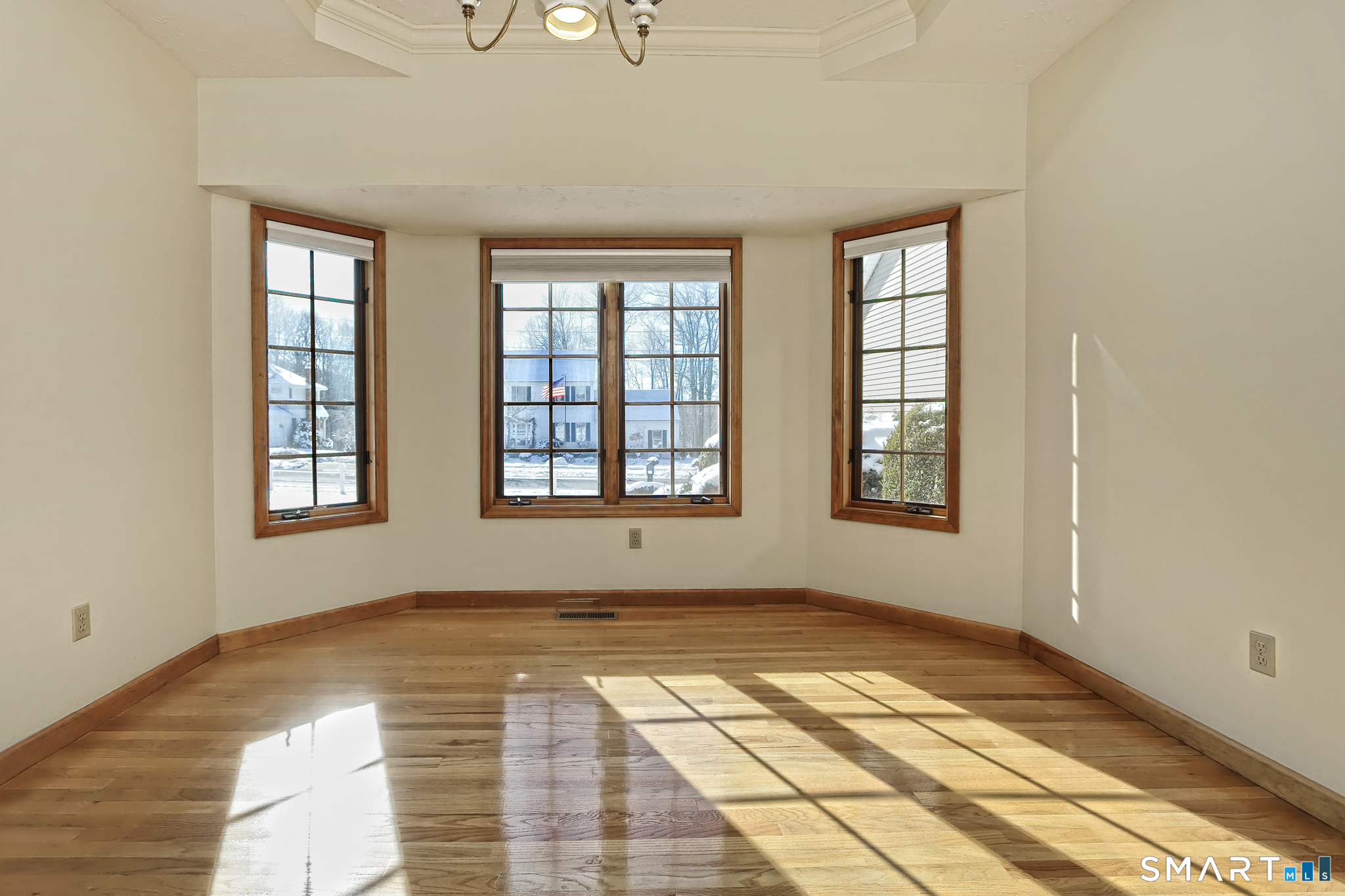 95 Ash Drive Hamden, CT 06518 - Photo 14 of 37 Large Dining Room Square Shape with nice sunlight.