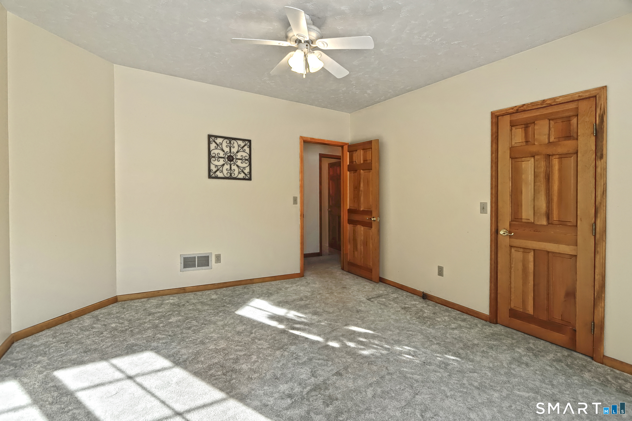 95 Ash Drive Hamden, CT 06518 - Photo 25 of 37 wall to wall carpet, ceiling fan
