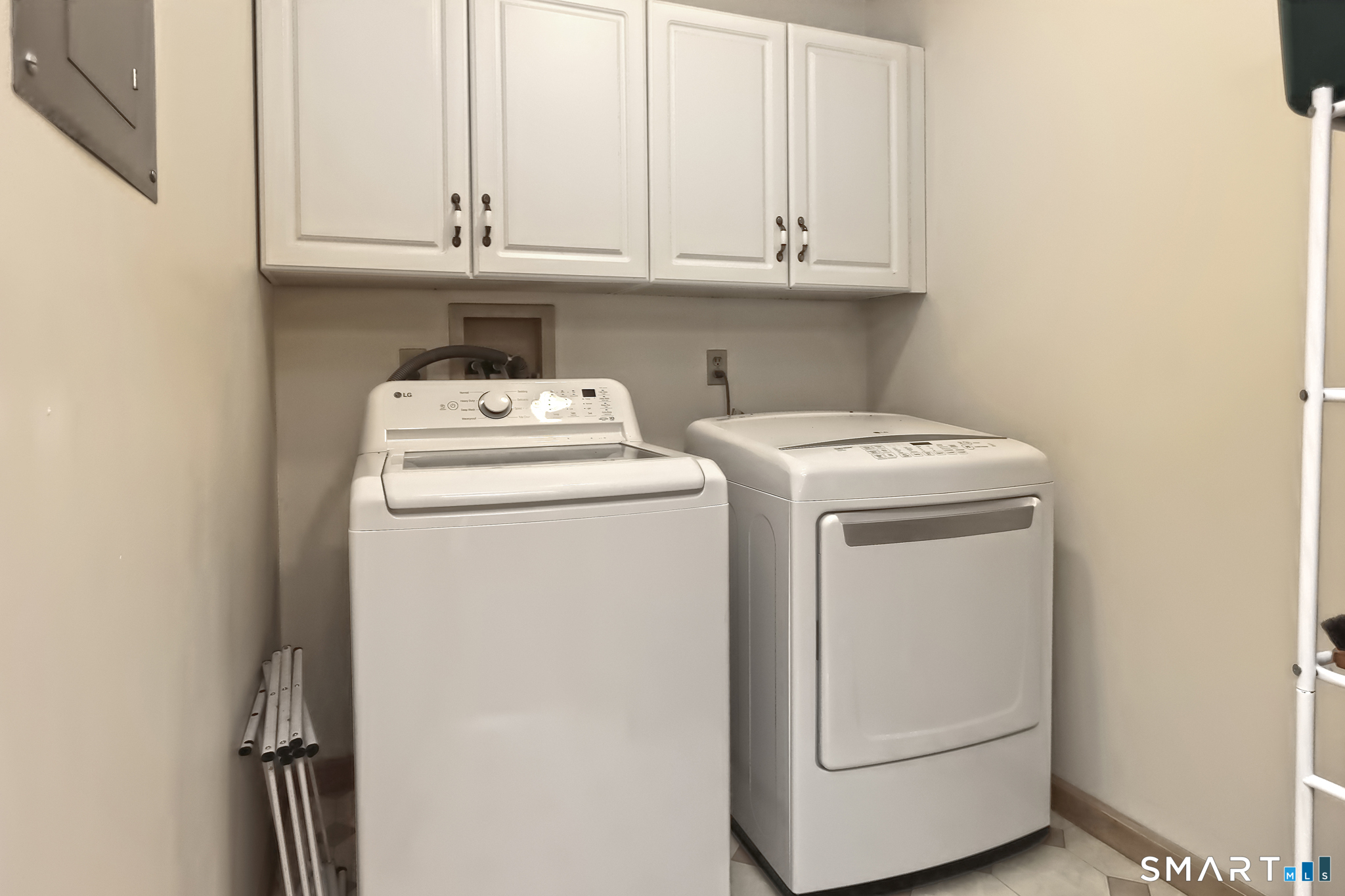 95 Ash Drive Hamden, CT 06518 - Photo 5 of 37 with Washer and Dryer, cabinetry & shelving for your convenience