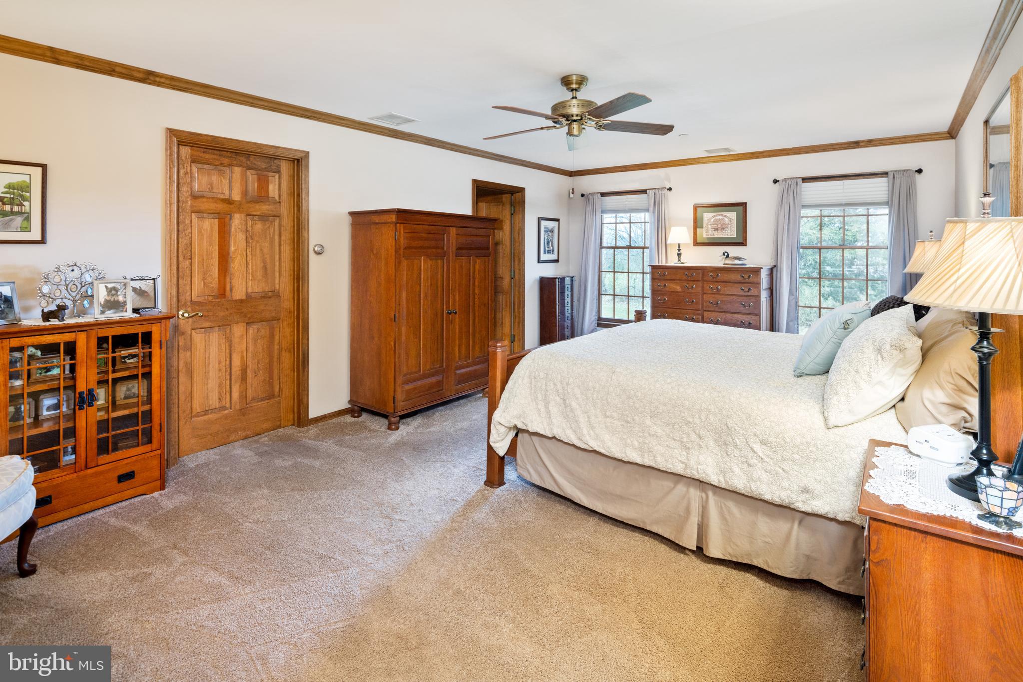 3556 Smith Road Furlong, PA 18925 - Photo 16 of 57 a bedroom with a large bed and furniture