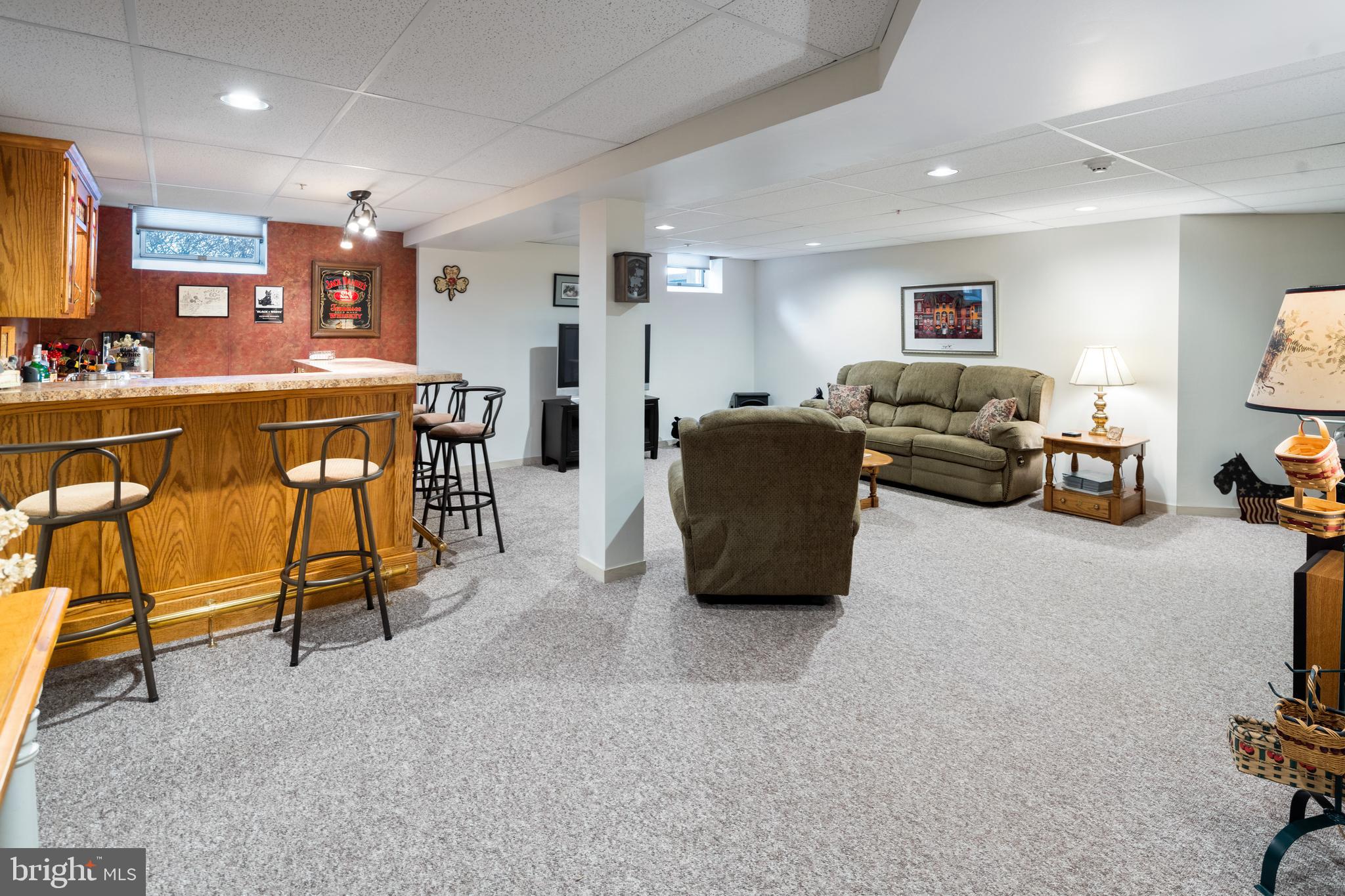3556 Smith Road Furlong, PA 18925 - Photo 30 of 57 a living room with furniture and a flat screen tv