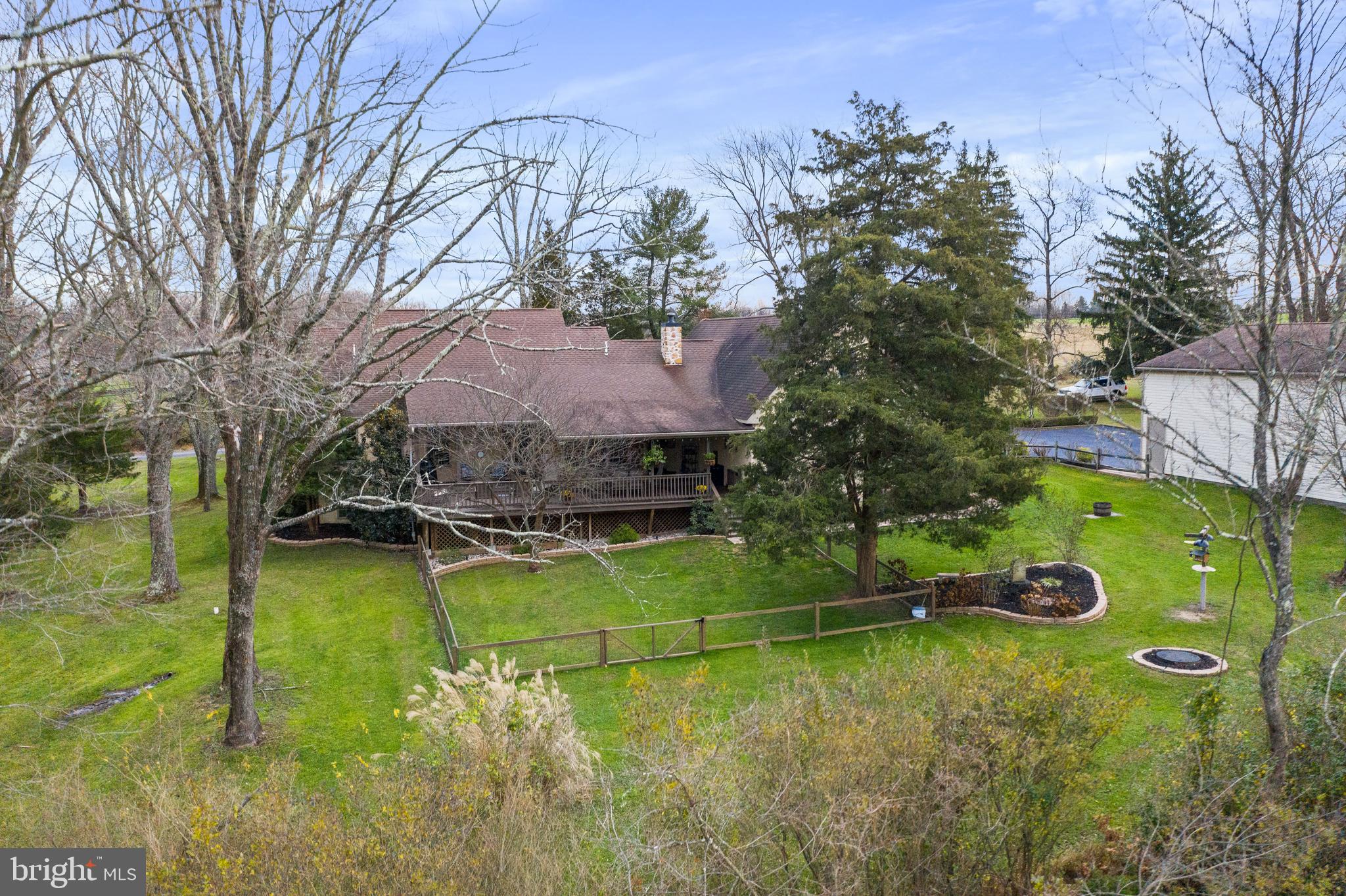 3556 Smith Road Furlong, PA 18925 - Photo 40 of 57 an aerial view of a house with pool yard basket ball court and outdoor seating