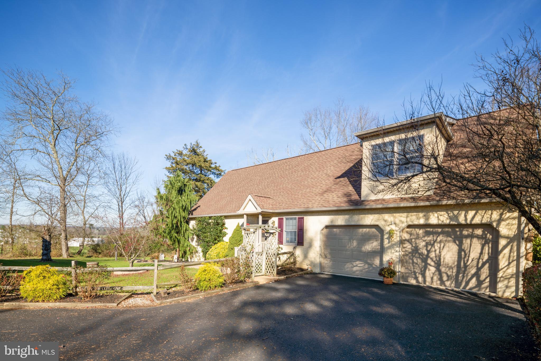 3556 Smith Road Furlong, PA 18925 - Photo 42 of 57 a view of swimming pool with outdoor seating and house in the background