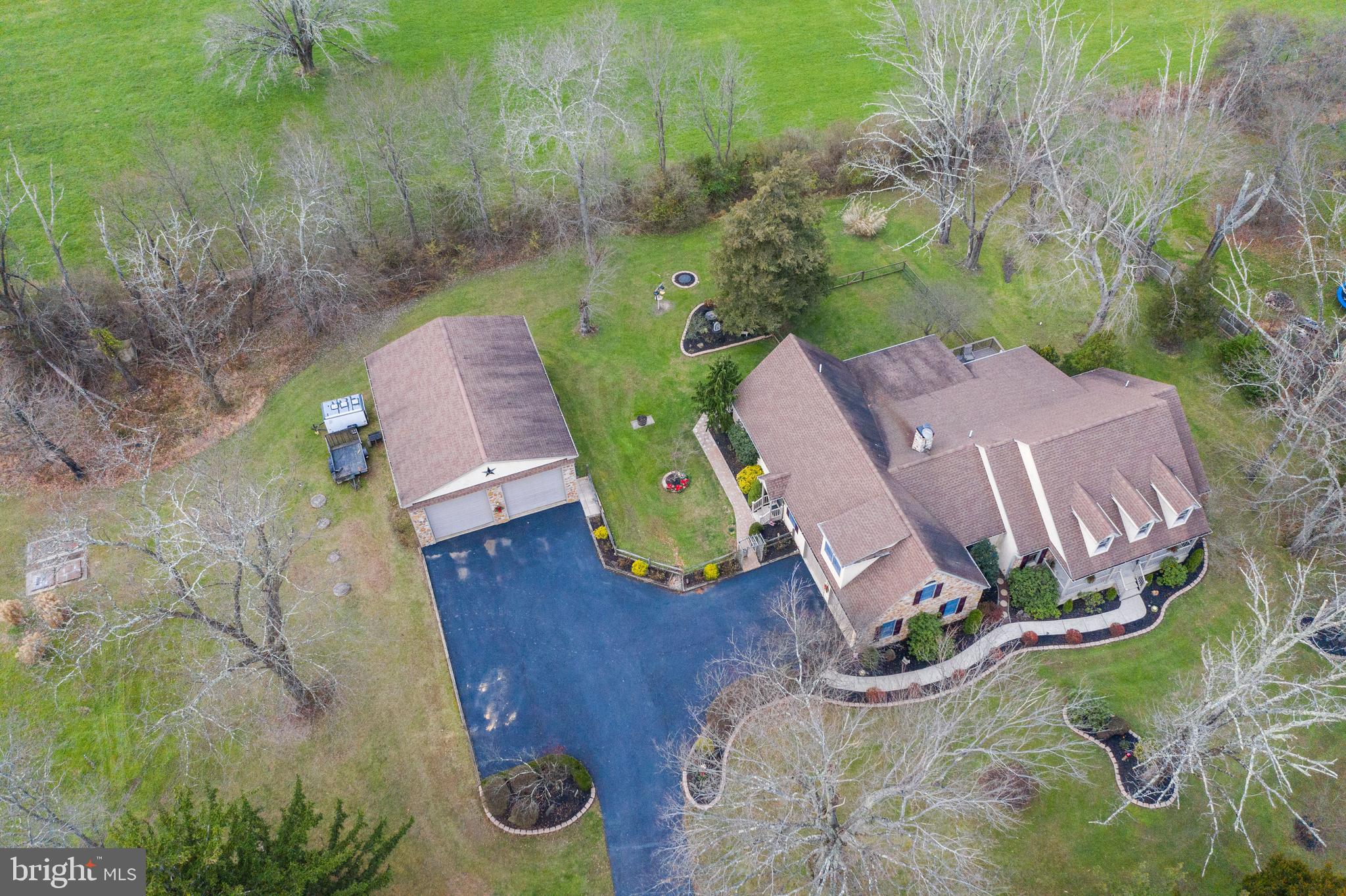 3556 Smith Road Furlong, PA 18925 - Photo 49 of 57 an aerial view of a house with garden space and street view