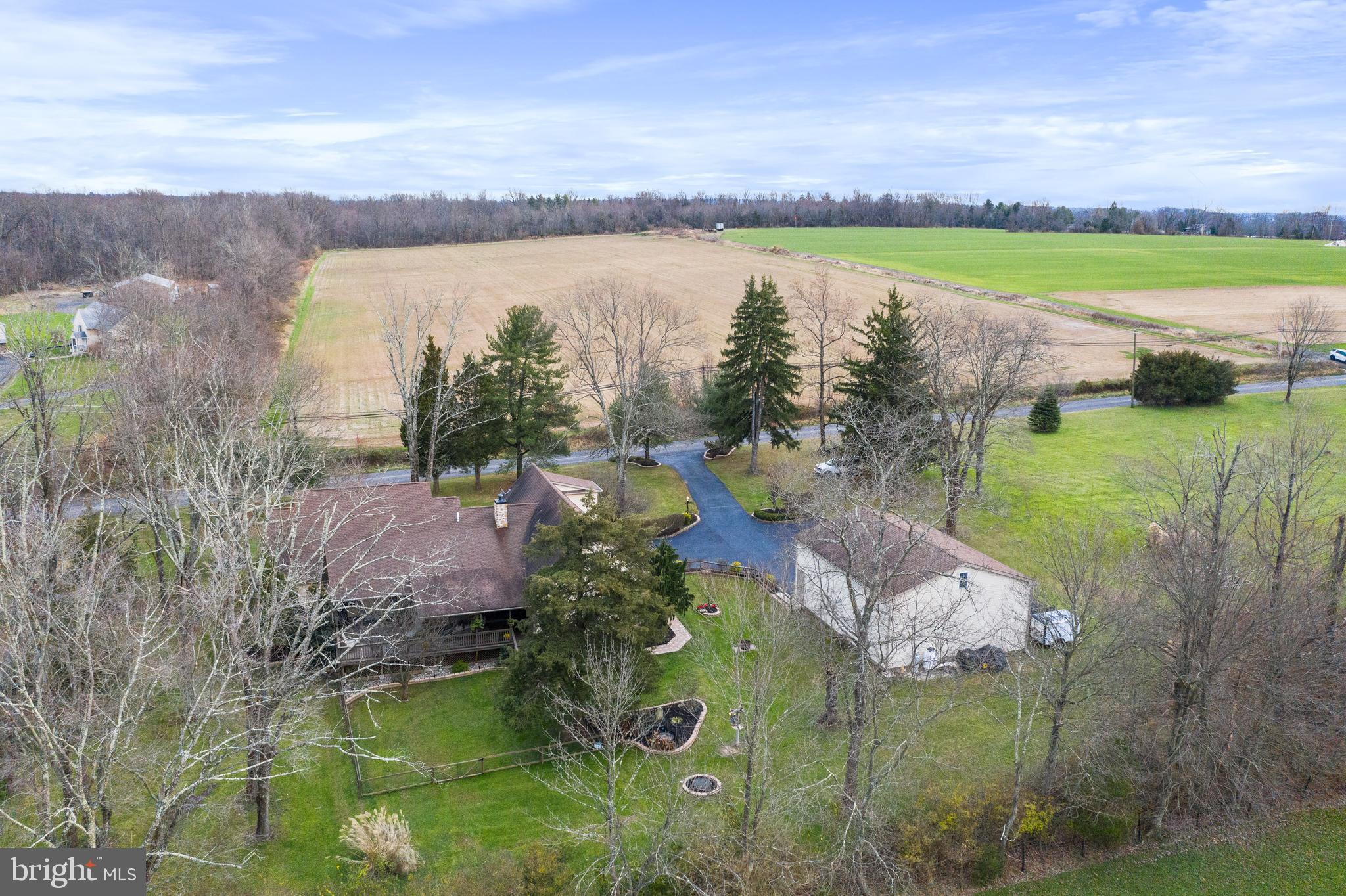 3556 Smith Road Furlong, PA 18925 - Photo 51 of 57 a view of a lake with houses in the back