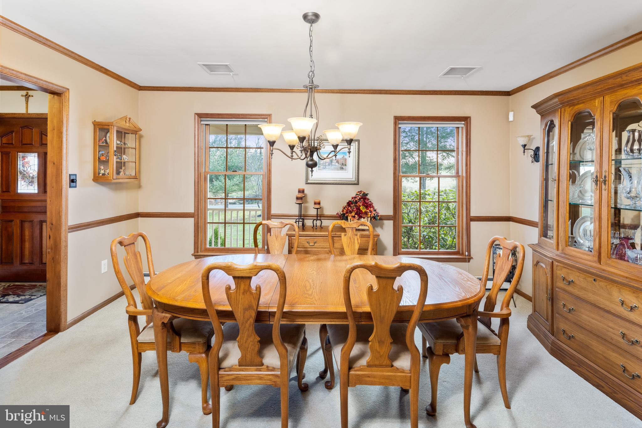 3556 Smith Road Furlong, PA 18925 - Photo 8 of 57 a view of a dining room with furniture wooden floor and chandelier