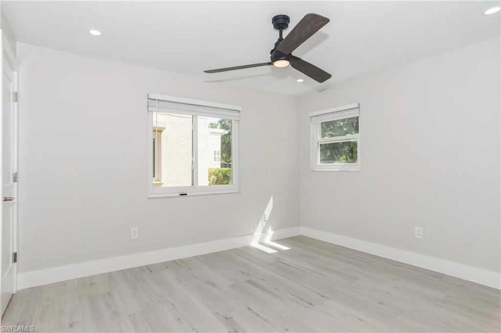 1155 Sandpiper Street, Unit B3 Naples, FL 34102 - Photo 13 of 21 Spare room featuring light wood-style flooring, recessed lighting, and ceiling fan