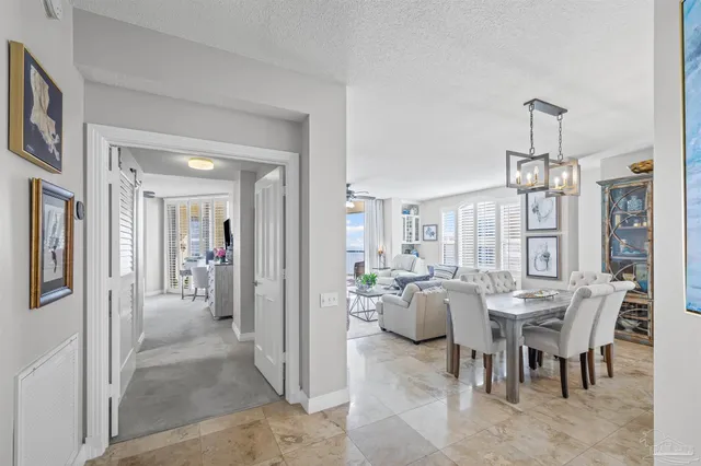 a view of a dining room with furniture