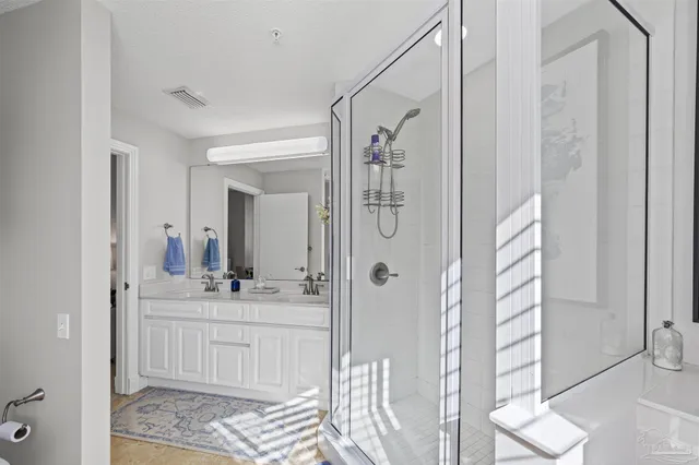 a bathroom with sink and mirror