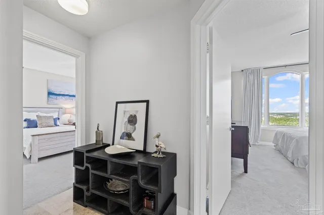 a view of a patio with a table and chairs