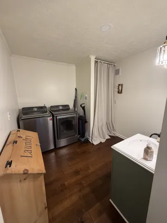 a utility room with dryer and washer