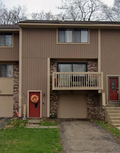 a front view of house with yard