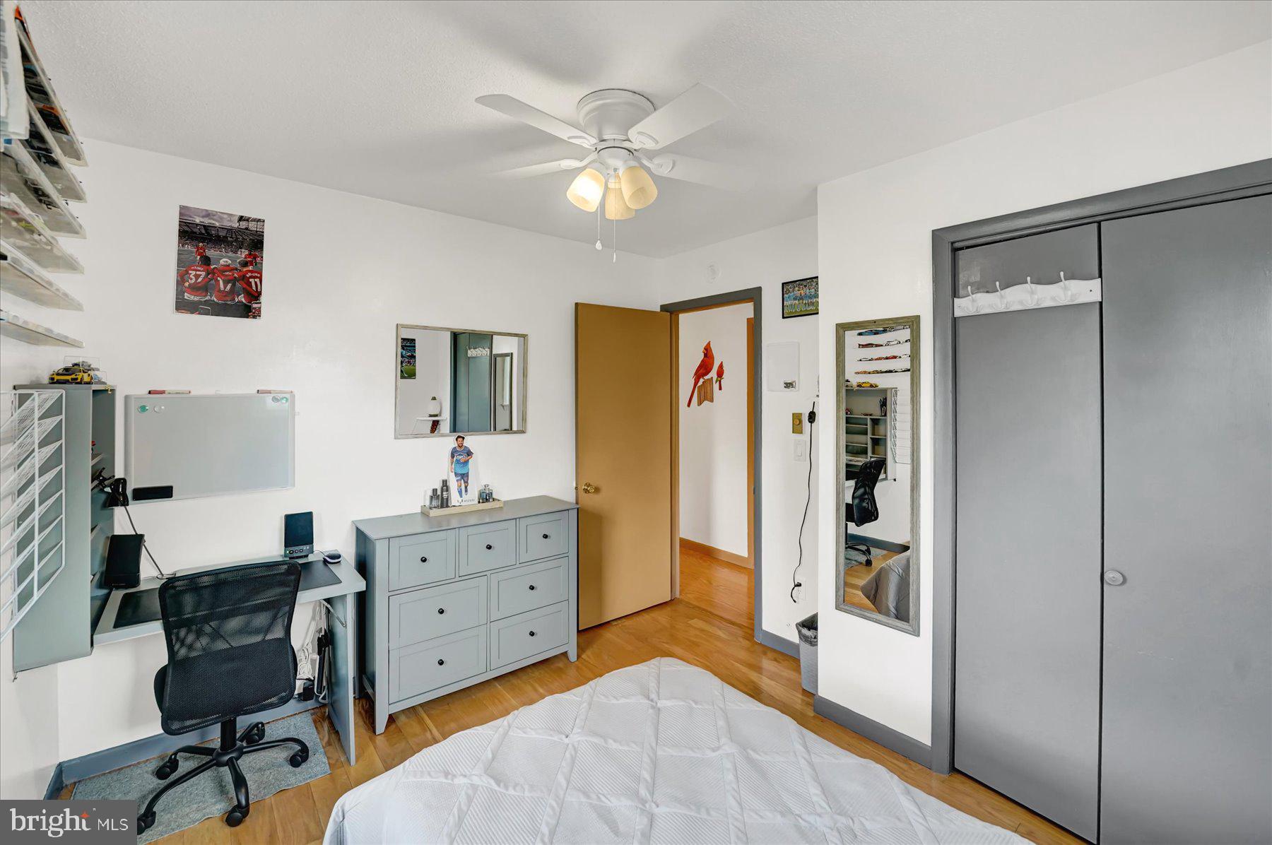 4814 West Whitehall Road Pennsylvania Furnace, PA 16865 - Photo 21 of 43 a bed room with a bed and a desk