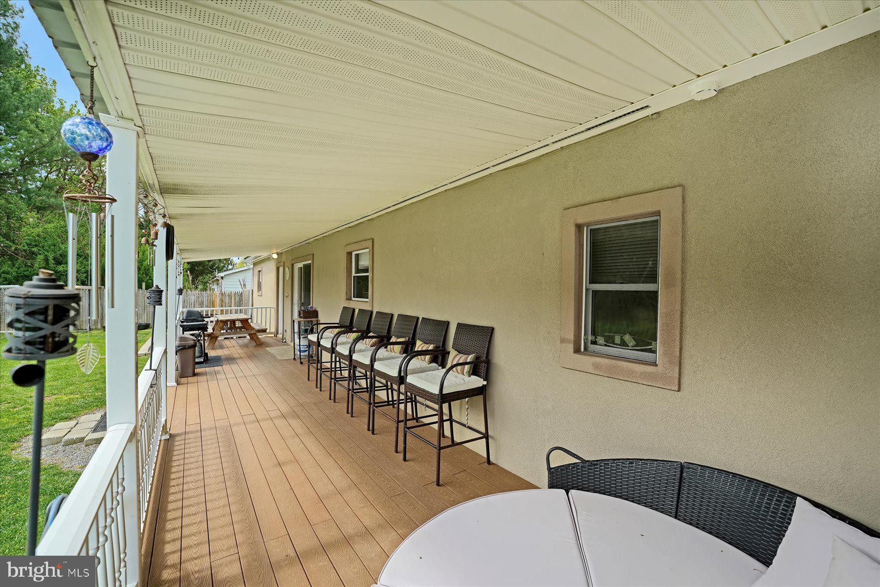 4814 West Whitehall Road Pennsylvania Furnace, PA 16865 - Photo 29 of 43 a view of a balcony with chairs