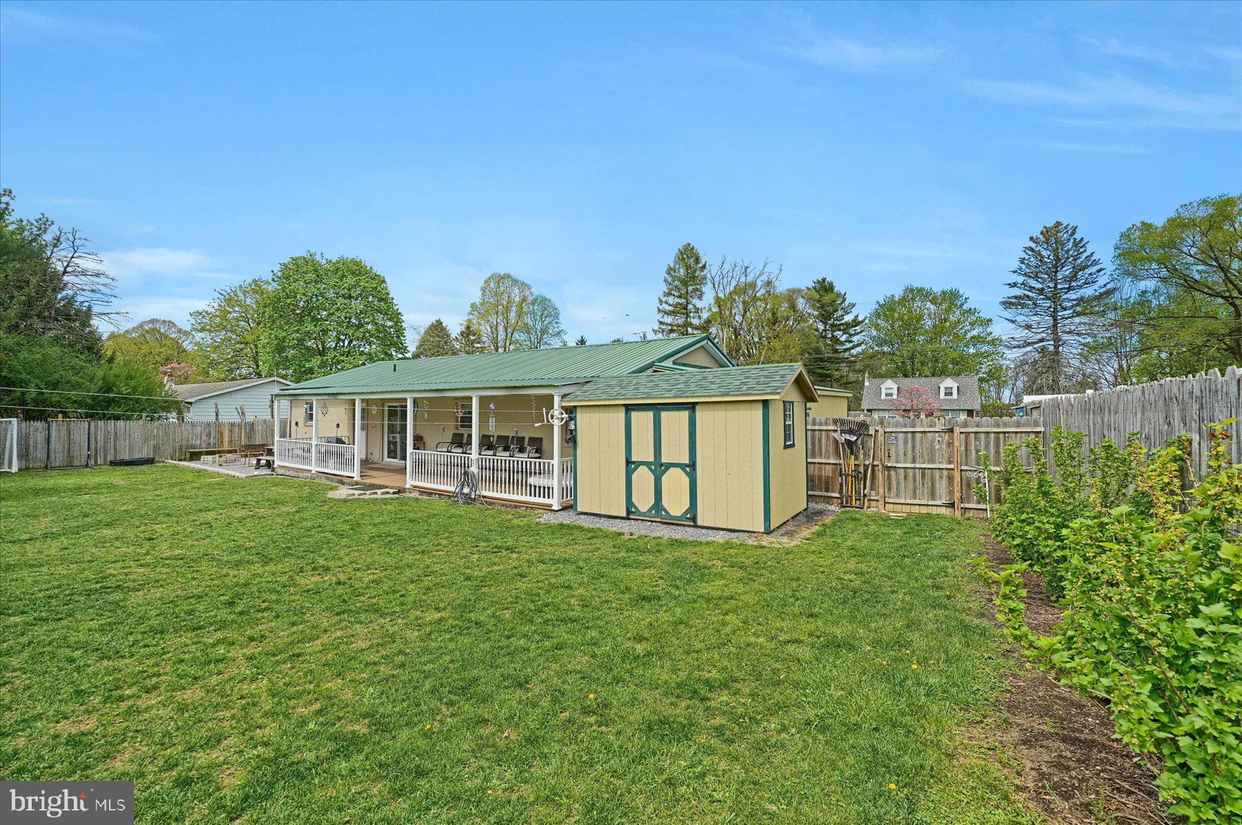 4814 West Whitehall Road Pennsylvania Furnace, PA 16865 - Photo 31 of 43 a view of a house with backyard and garden