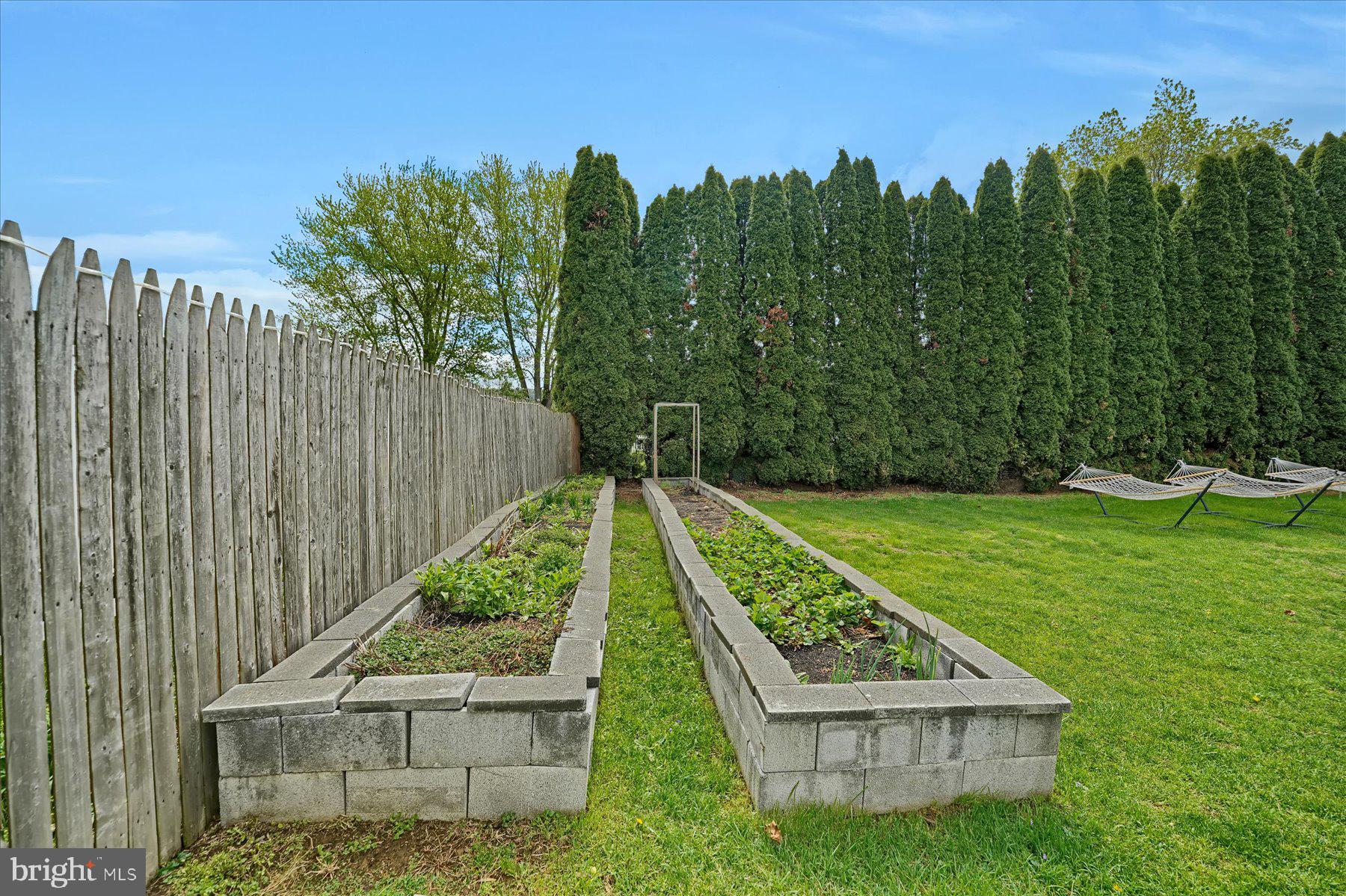 4814 West Whitehall Road Pennsylvania Furnace, PA 16865 - Photo 32 of 43 a garden view with a seating space