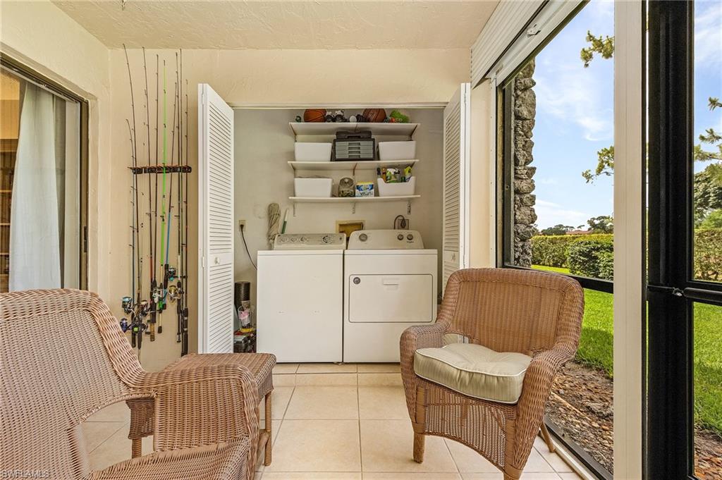 5789 Gage Lane, Unit A 103 Naples, FL 34113 - Photo 21 of 26 a living room with furniture and a window