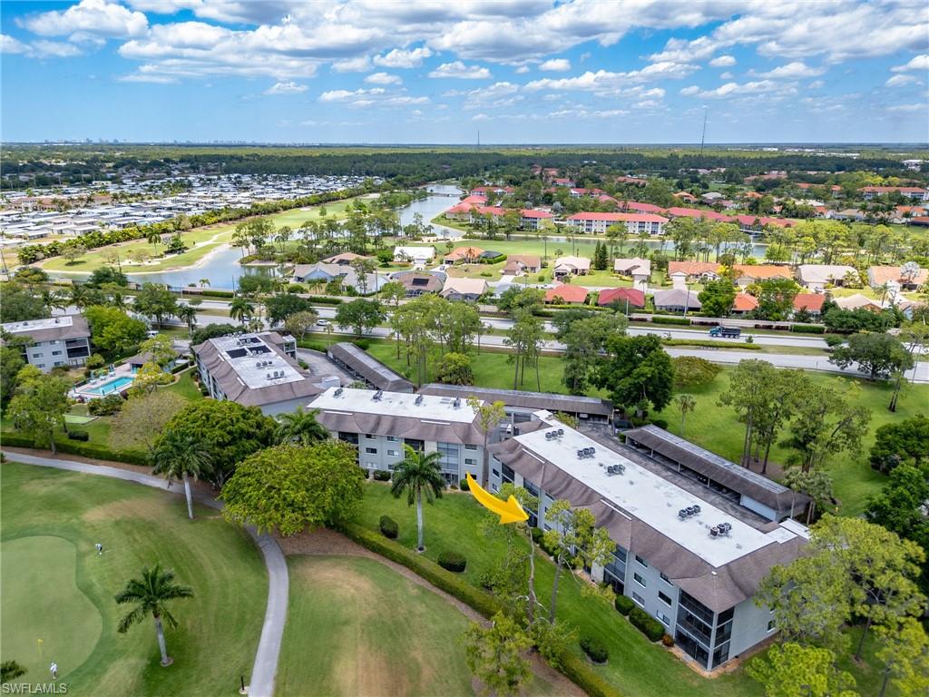 5789 Gage Lane, Unit A 103 Naples, FL 34113 - Photo 26 of 26 a view of a city with an ocean view