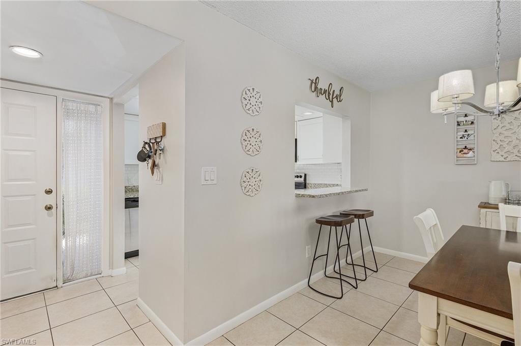 5789 Gage Lane, Unit A 103 Naples, FL 34113 - Photo 5 of 26 a view of room with furniture