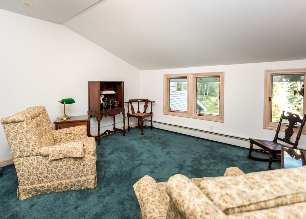 93 Old County Road Lincoln, MA 01773 - Photo 15 of 30 a living room with furniture rug and window