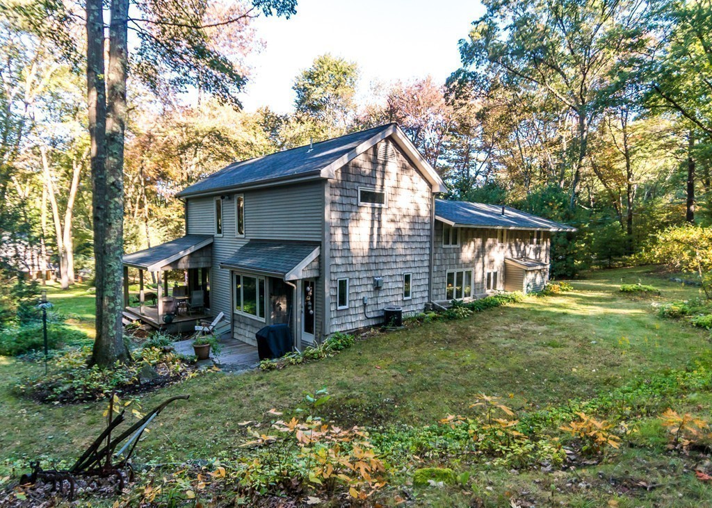 93 Old County Road Lincoln, MA 01773 - Photo 25 of 30 a view of a house with a yard and sitting area