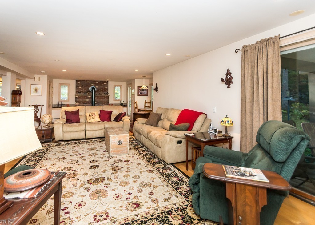 93 Old County Road Lincoln, MA 01773 - Photo 10 of 30 a living room with furniture and a couch