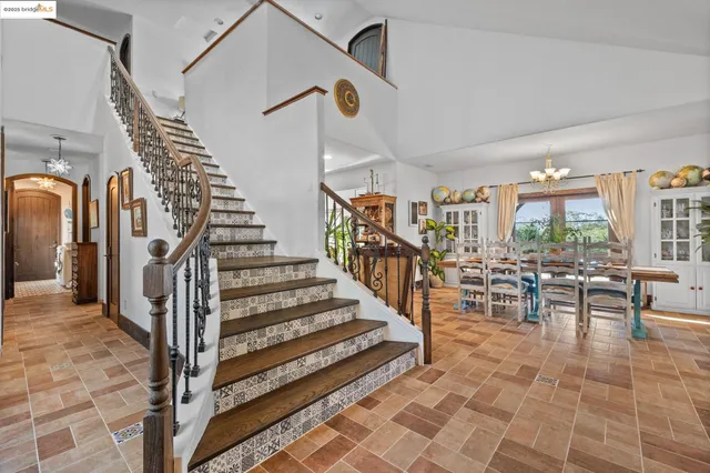 a view of entryway and hall with dining room