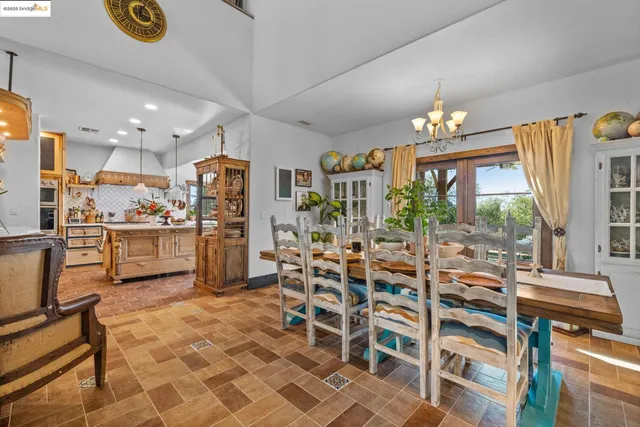 a view of a dining room kitchen and a window