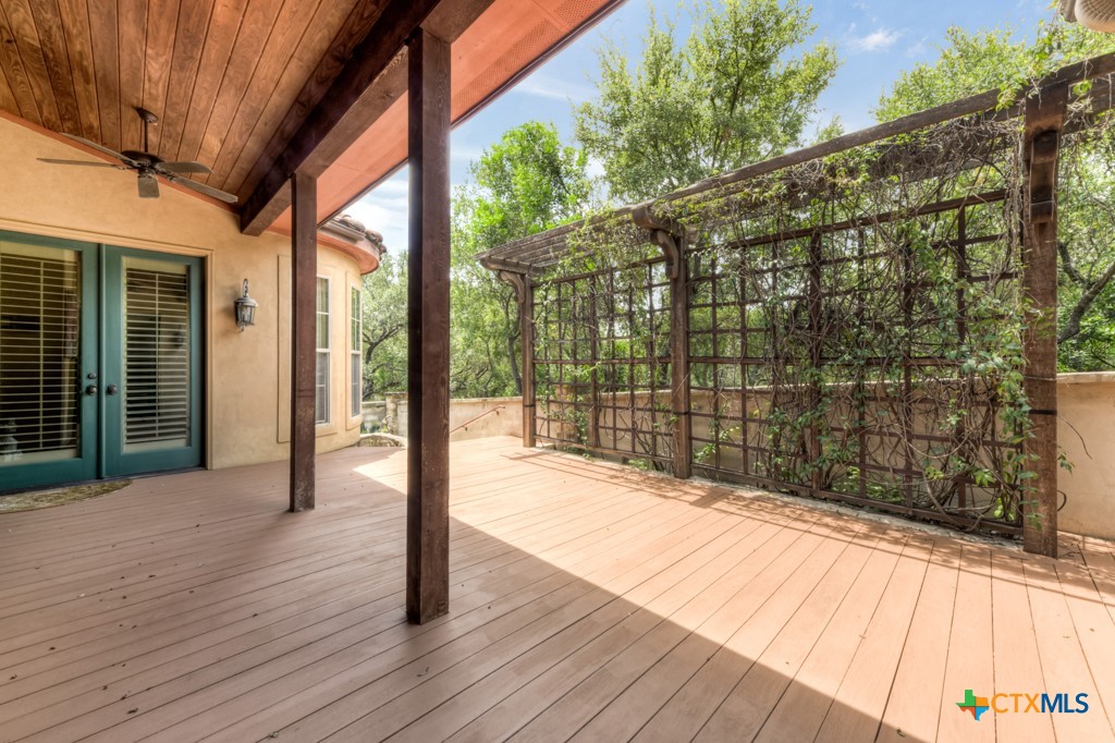1108 Tuscan Ridge Drive New Braunfels, TX 78130 - Photo 30 of 47 a view of backyard with wooden floor and fence