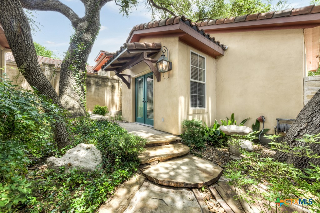 1108 Tuscan Ridge Drive New Braunfels, TX 78130 - Photo 34 of 47 a view of a house with a yard and sitting area