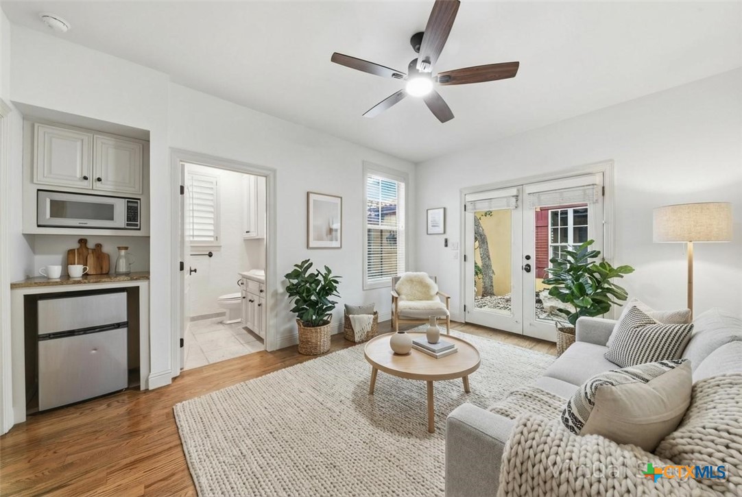 1108 Tuscan Ridge Drive New Braunfels, TX 78130 - Photo 36 of 47 a living room with furniture potted plant and a window