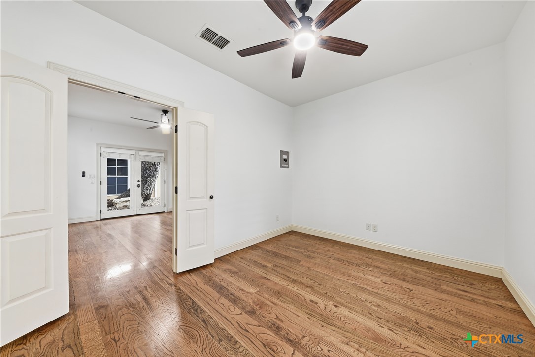 1108 Tuscan Ridge Drive New Braunfels, TX 78130 - Photo 40 of 47 wooden floor in an empty room