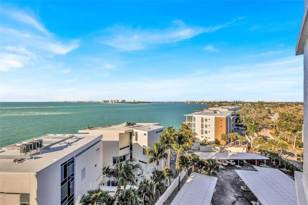 4822 Ocean Boulevard, Unit 8D Siesta Key, FL 34242 - Photo 14 of 69 a view of a city and ocean view