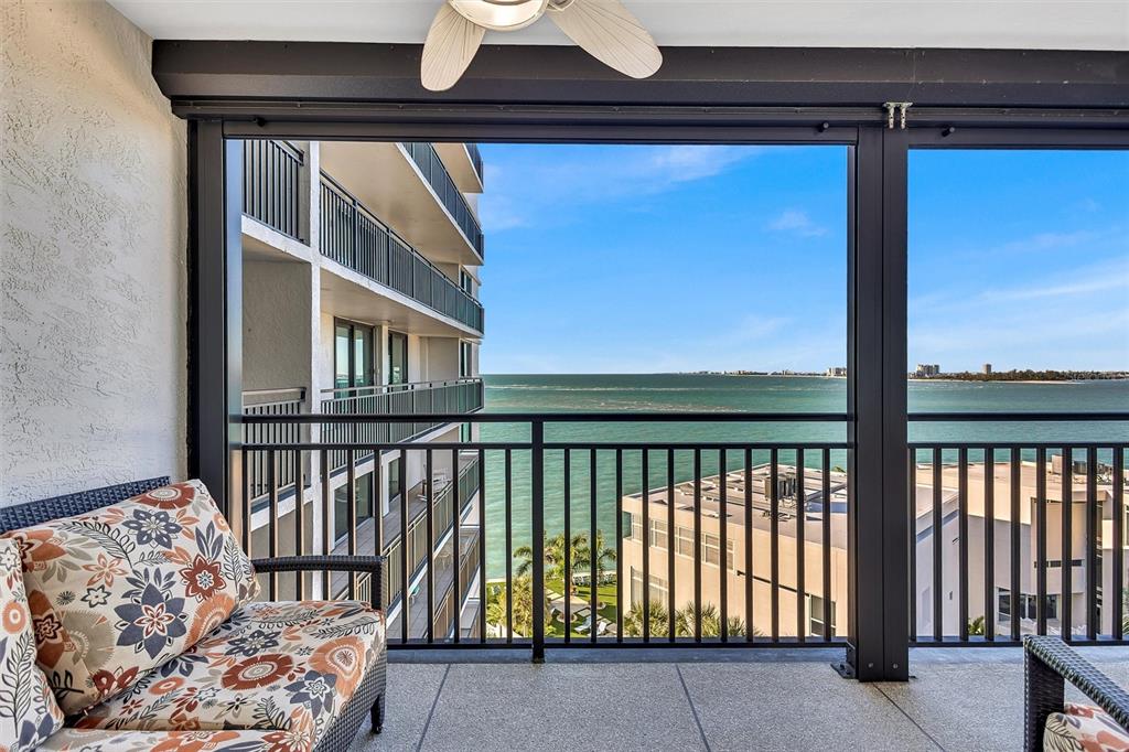 4822 Ocean Boulevard, Unit 8D Siesta Key, FL 34242 - Photo 15 of 69 a view of a balcony with furniture