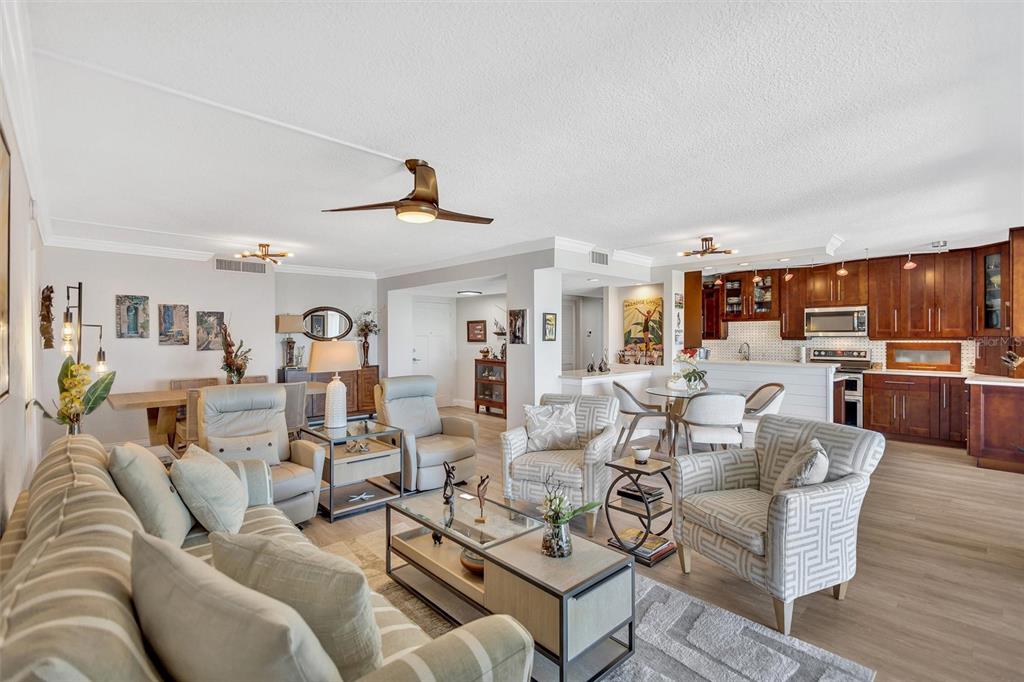 4822 Ocean Boulevard, Unit 8D Siesta Key, FL 34242 - Photo 21 of 69 a living room with furniture and view of kitchen